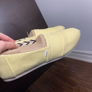 Toms Light Yellow Canvas Slip-Ons